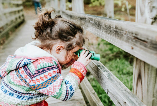 Girl with binoculars