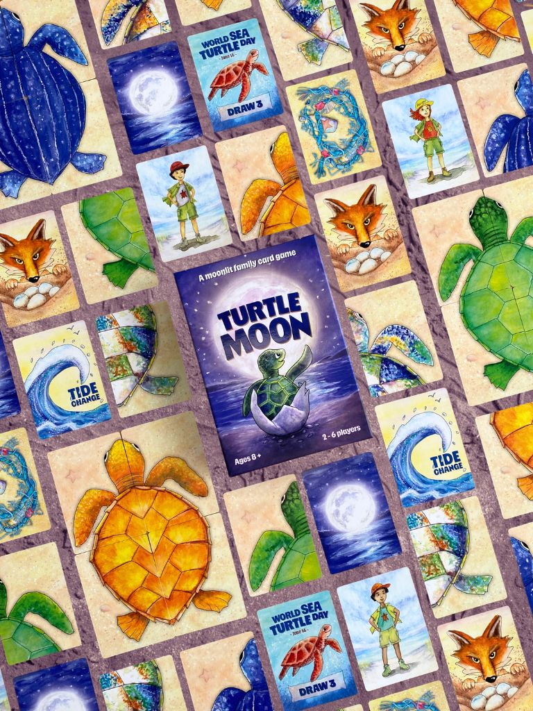 The board game 'Turtle Moon' shown with its central box and several illustrated cards arranged in a flat-lay collage pattern. The artwork features sea turtles, foxes, a turtle ranger character, and a moonlit ocean scene on a grid background.